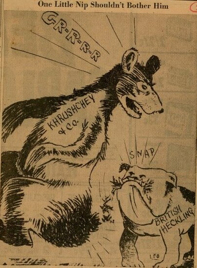 A political cartoon depicting a bulldog biting the tail of a bear. The dog is labeled as "British Heckling" while the bear is labeled "Khrushchey & Co"